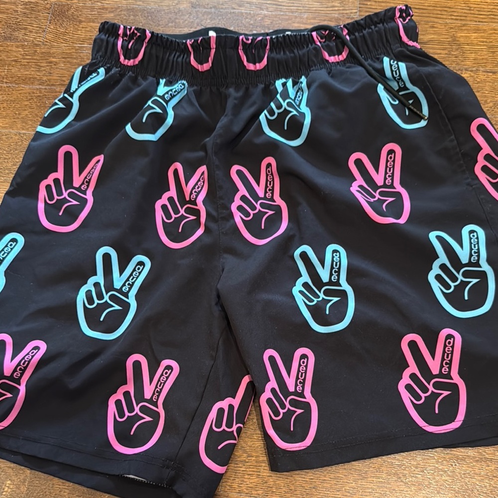 Black and Pink Athletic Shorts with Peace Sign Pattern